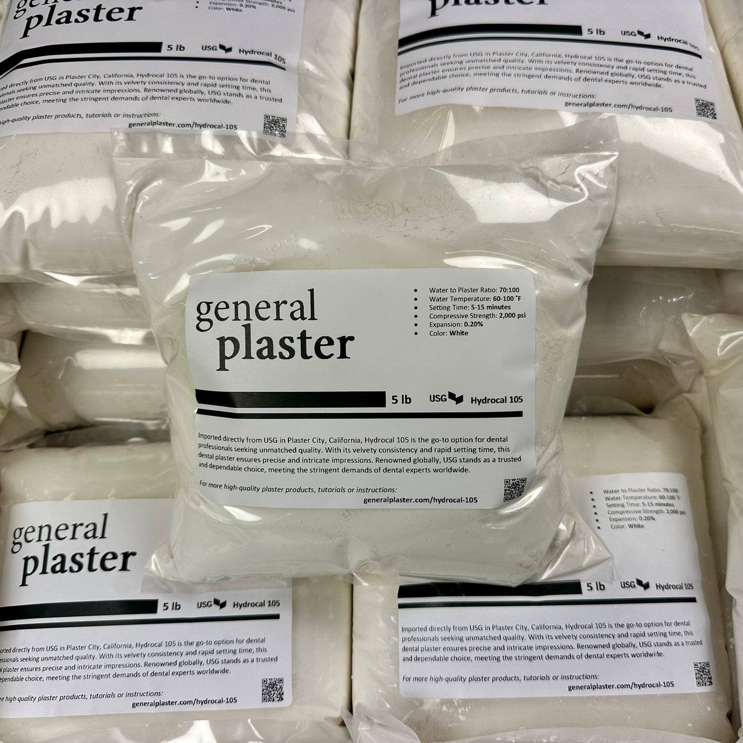 Sealed 5 lb bag of USG Hydrocal 105 from GP on a stack