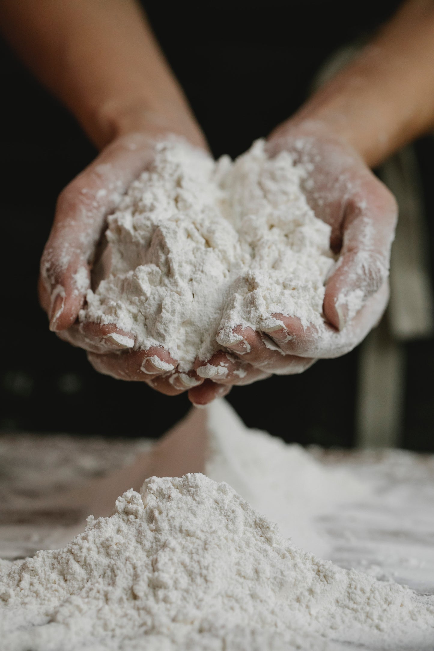 In house photo of hands working with and holding some USG Moulding Plaster No.1